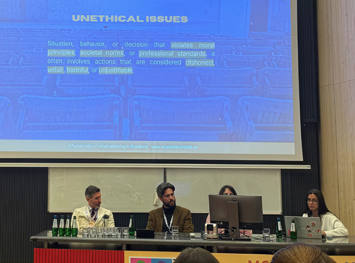 MCAA Satellite Event – Final Conference of the Pandora Box of Whistleblowing in Academia (PAOLA) Project, held on March 20, 2025. On the podium (left to right): Gianluigi Maria Riva (Legal Insights), Francisco Valente Gonçalves (Principal Investigator), Szidonia Rusu (Observatory Presentation), and Susana Sousa Lourenço (Data Insights)
