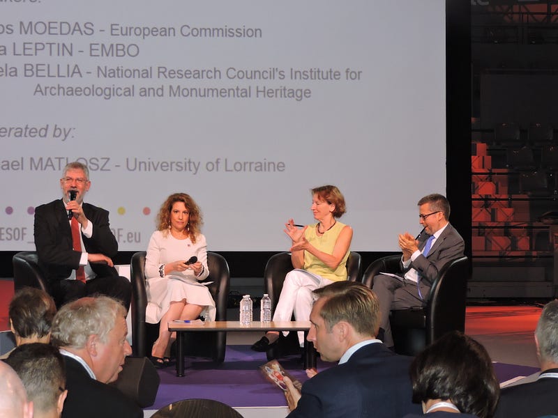 Plenary panel discussion “Horizon Europe: The Future European Framework for Research and Innovation Beyond Horizon 2020” at the EuroScience Open Forum in Toulouse 2018. Participants: Carlos Moedas (Commissioner for Research, Science and Innovation at the European Commission), Maria Leptin (Director at the European Molecular Biology Organization EMBO), Angela Bellia (Institute for Archaeological and Monumental Heritage at the National Research Council of Italy and Chair of the Events and Network Working Group of the MCAA), and Michael Matlosz (President-elect of EuroScience and member of the ESOF 2018 Steering Committee). Photo: Salvatore D’Andrea.