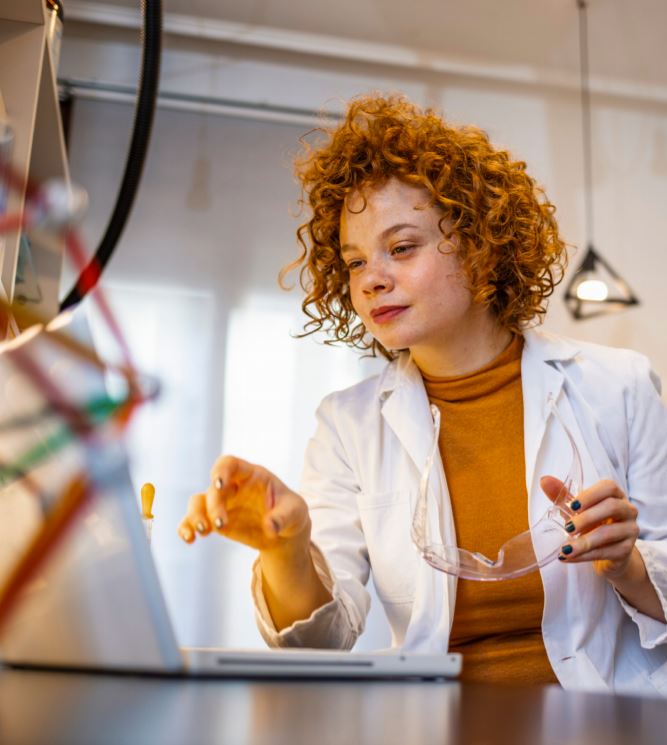 Woman in front of laptop